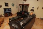 Living room offers a flat screen HDTV